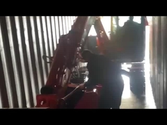 het laden en bevestigen van de graafmachine