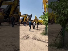 Angola klant selecteert de gebruikte graafmachine